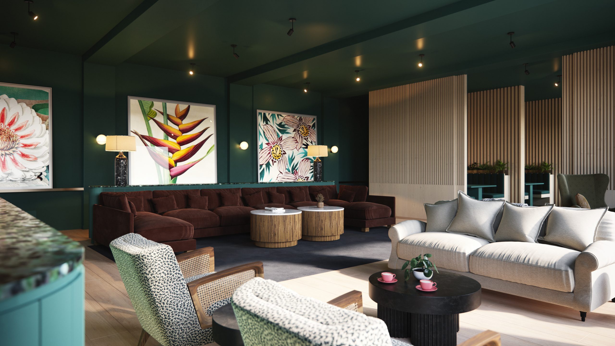 Modern communal lounge area with plush seating, decorative artwork, and stylish coffee tables, highlighting amenities at Moda, Holland Park, Glasgow.