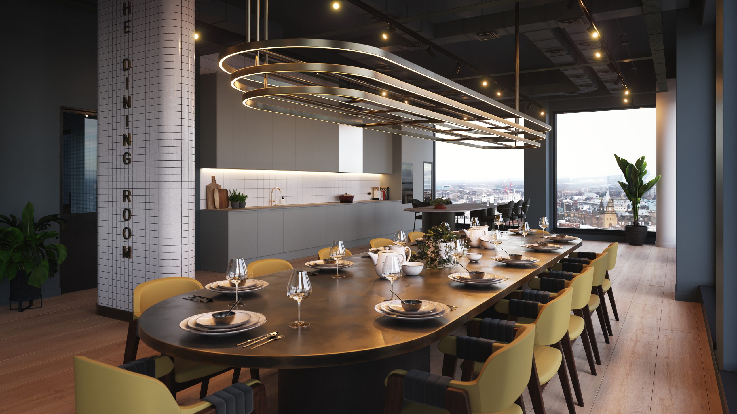 Modern dining room in a stylish studio apartment at Moda, Holland Park, featuring a long table set for dining, contemporary lighting, and a view of Glasgow’s skyline.